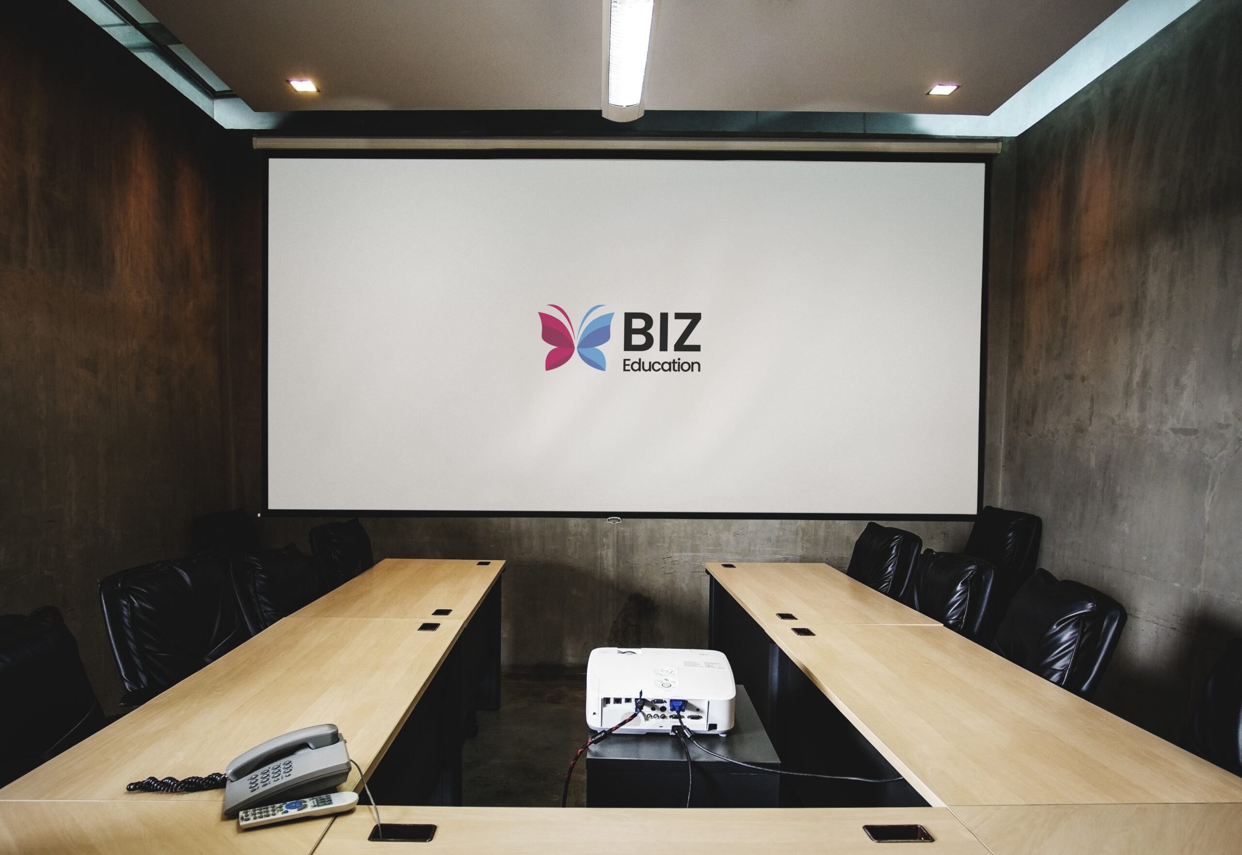 Blank white projector screen mockup in a meeting room